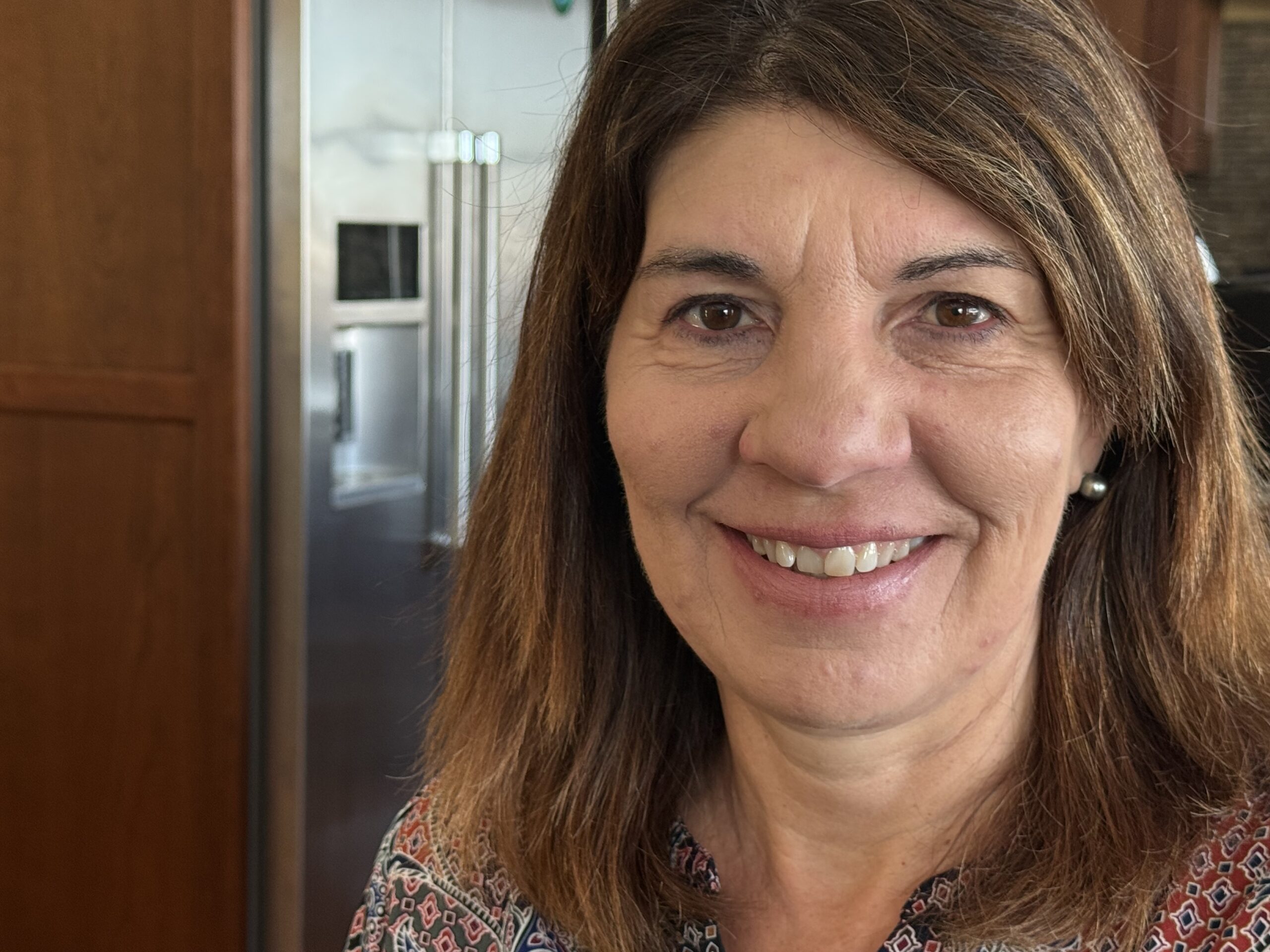 Kathy Friedrich inside her kitchen in her home in Dayton.